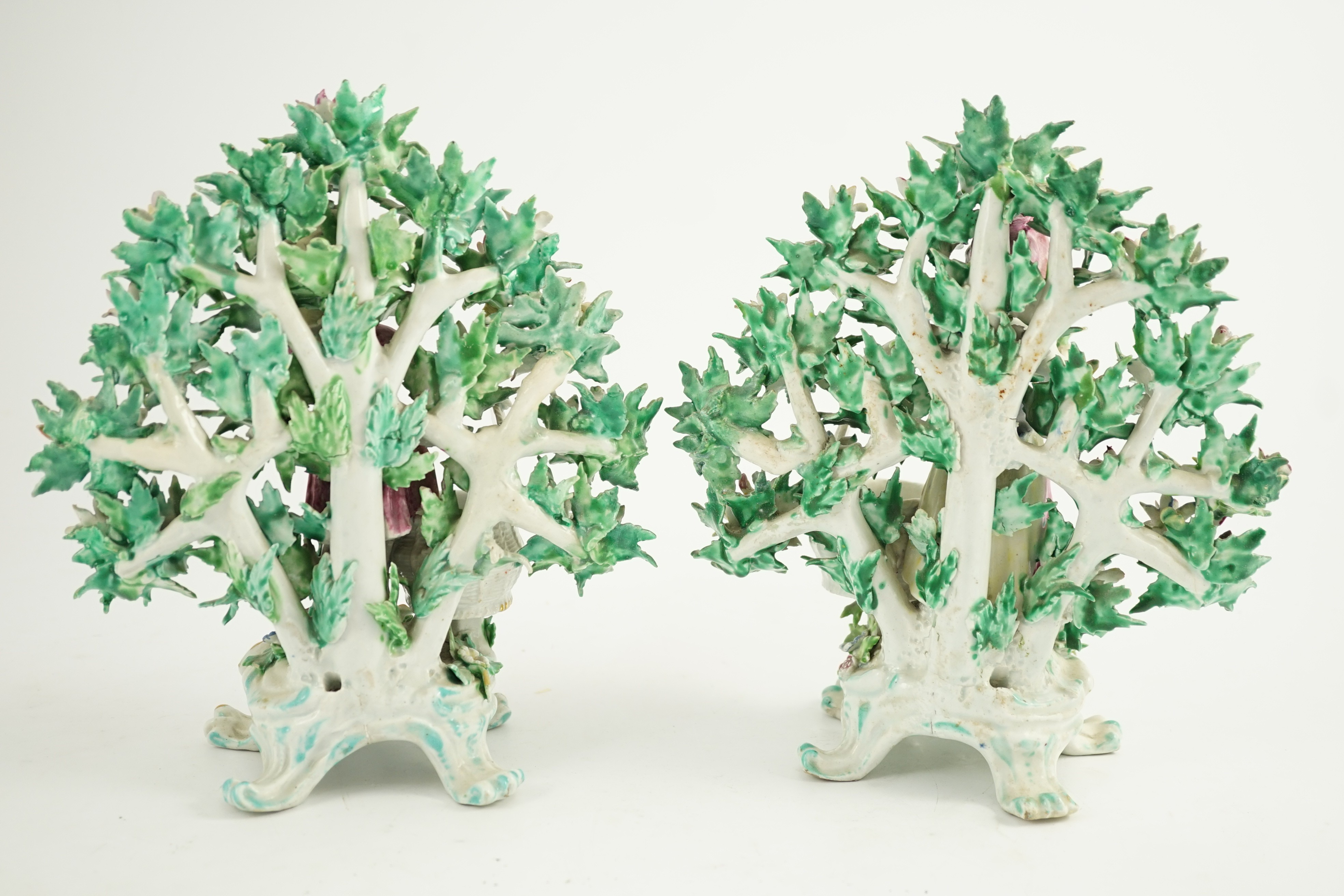 A good pair of Bow porcelain bocage figures, c.1770, 22cm high